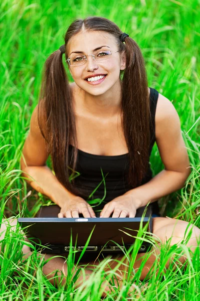 Gay pretty young woman glasses laptop — Stock Photo, Image