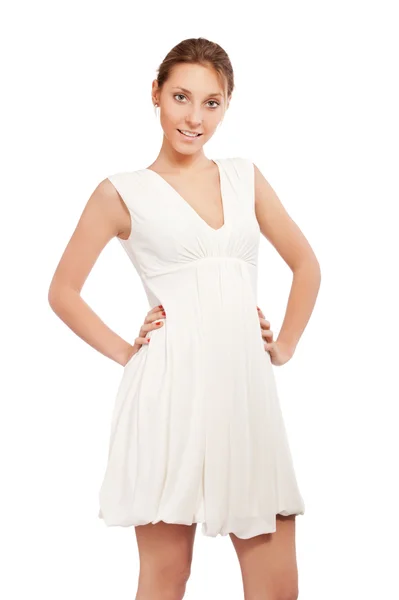 Portret van een mooi meisje in een witte jurk geïsoleerd op wit — Stockfoto