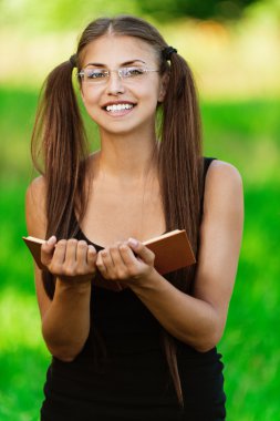 Smiling woman read book clipart