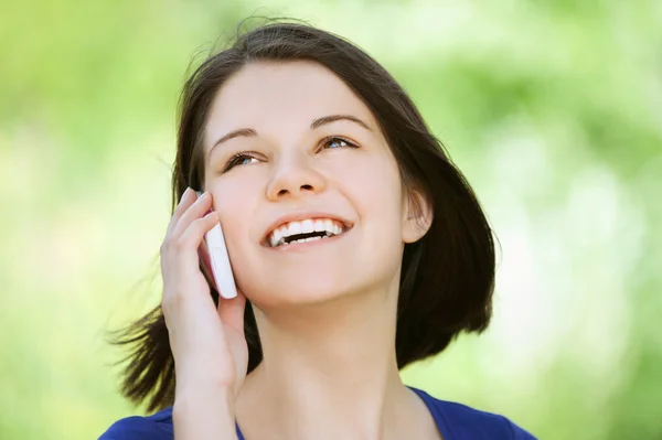 Young girl talking at the cell phone — Stock Photo, Image
