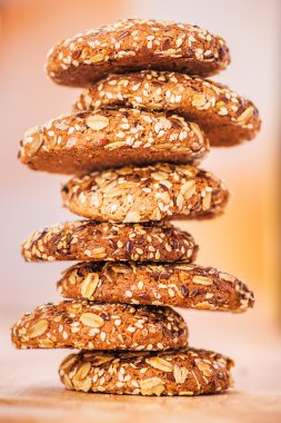 Oatmeal cookies with a splash of sunflower seeds, sesame seeds clipart