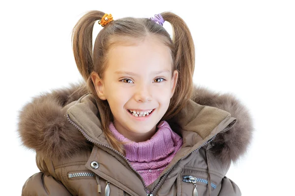 Kleines Mädchen in brauner Jacke — Stockfoto