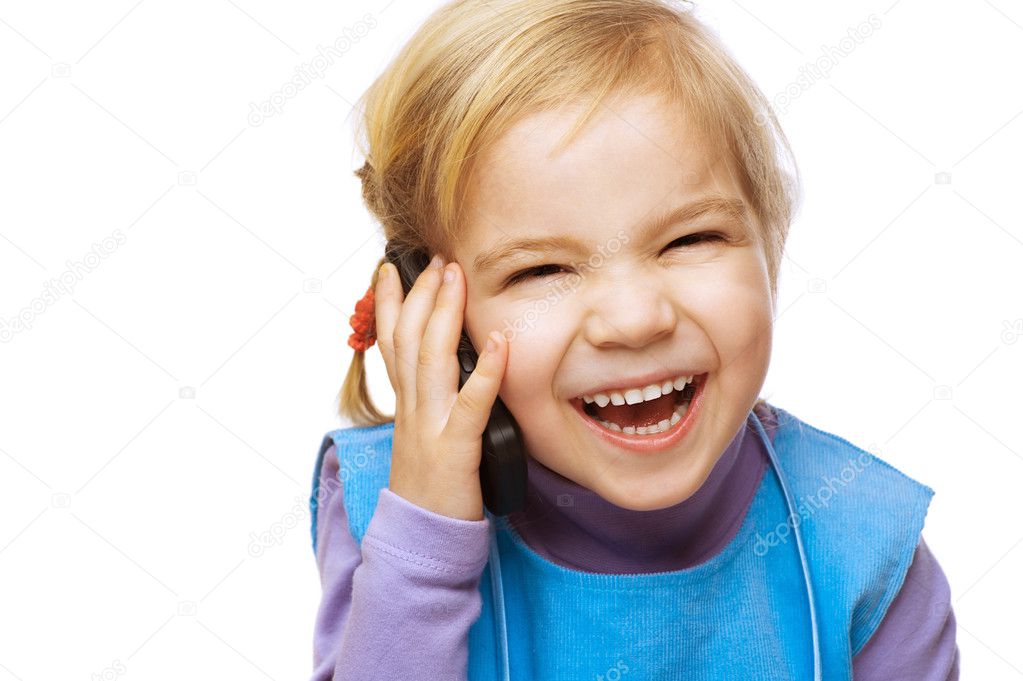 Little smiling girl with phone