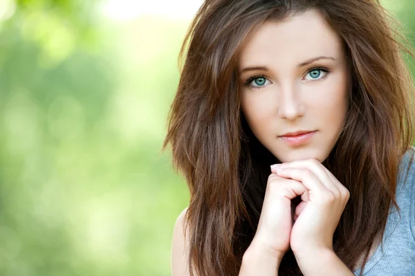 Portrait of young long-haired woman — Stock Photo, Image