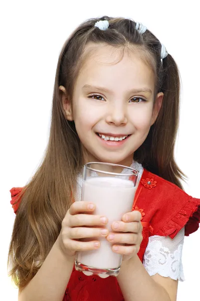 Pequena menina sorridente com leite — Fotografia de Stock