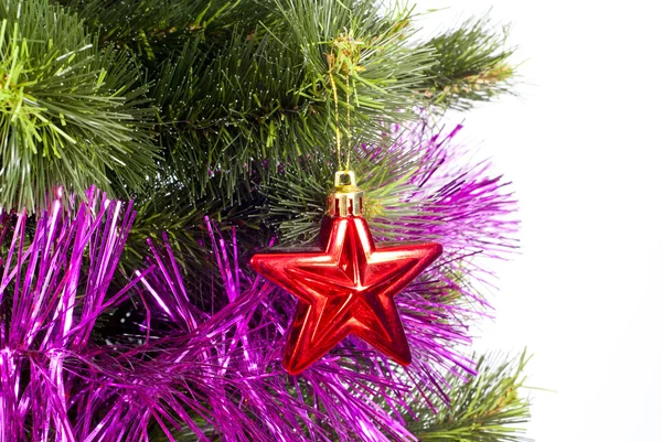 Del av julgran med dekorationer — Stockfoto