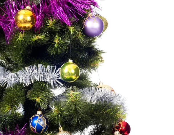 Árbol de Navidad fondo con juguetes de colores — Foto de Stock
