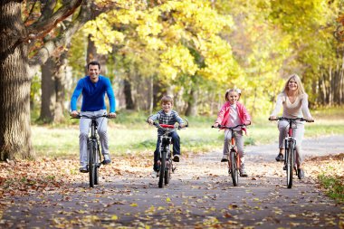 Family on bikes clipart