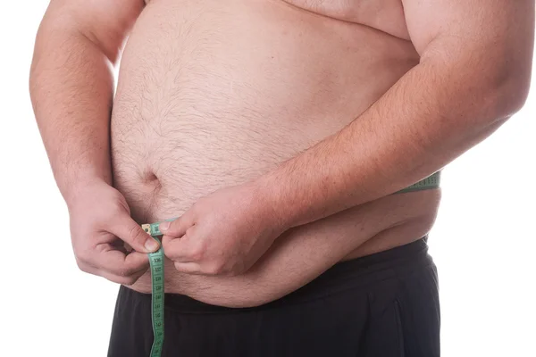 Толстяк с измерительной лентой — стоковое фото