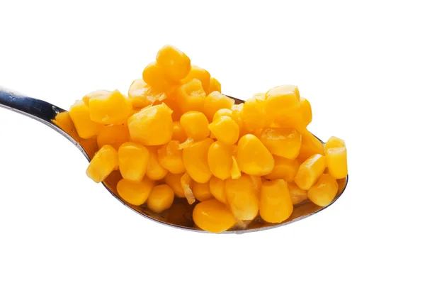 Corn in spoon — Stock Photo, Image