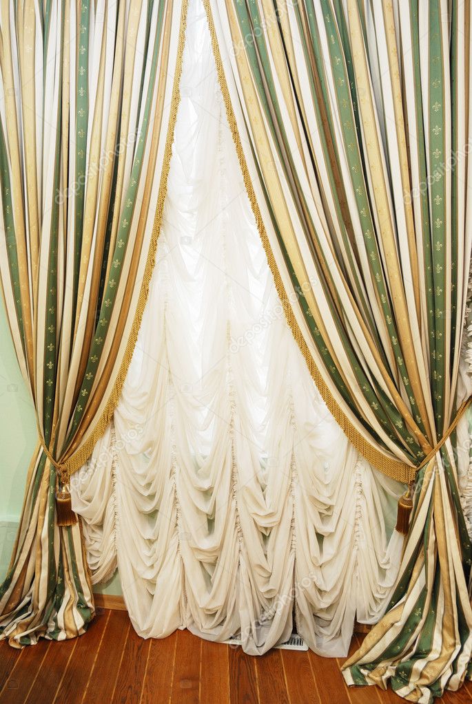 Window with striped curtians and tulle