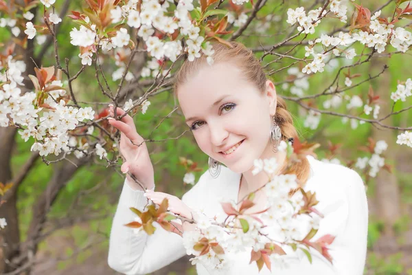 Spring blooming and girl — Stock Photo, Image