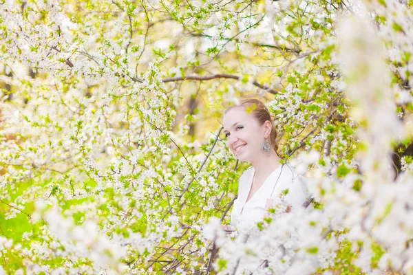 Spring blooming and girl — Stock Photo, Image