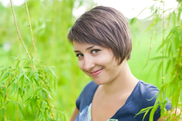 stock image Girl in a summer forest