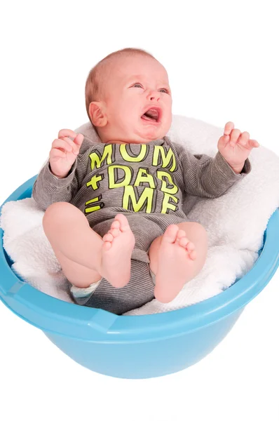 Cute baby portrait in washbasin isolated on white background — Stock Photo, Image