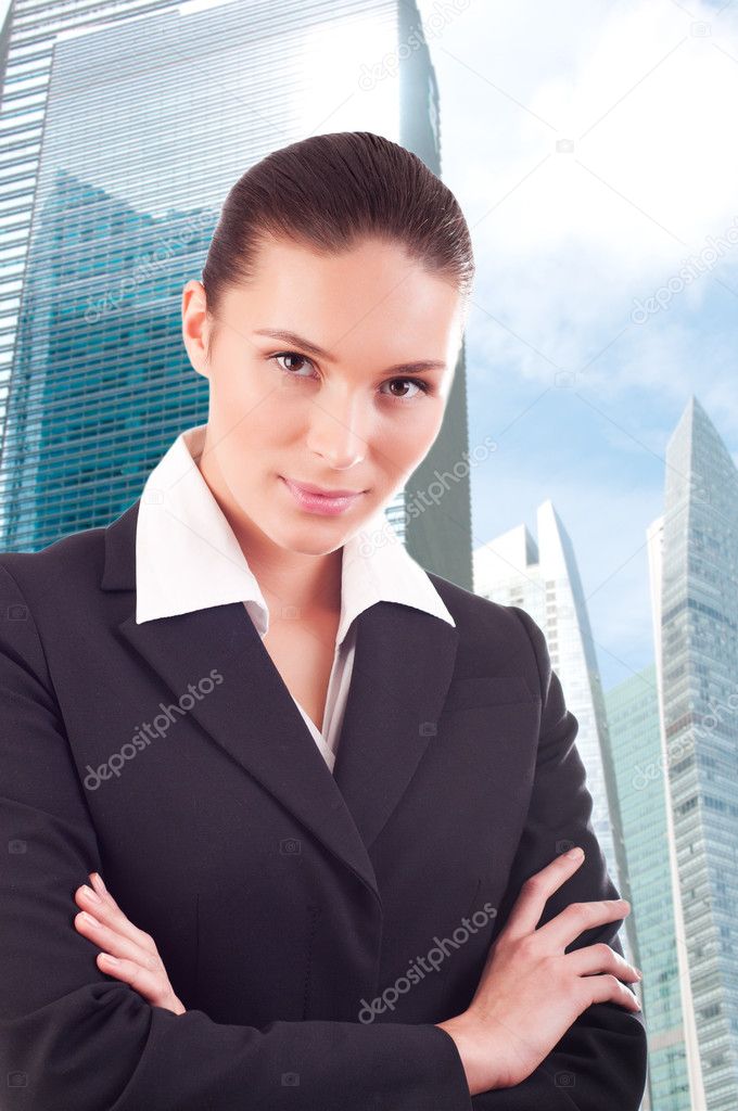 Young business woman over business center background