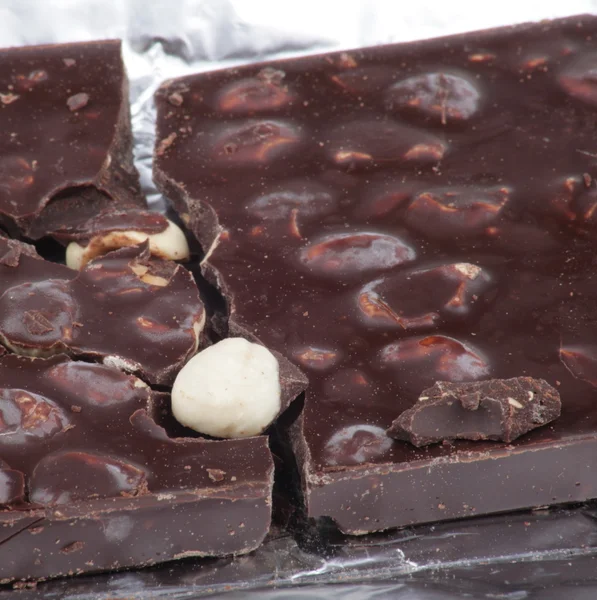 stock image Bar of brown chocolate in foil