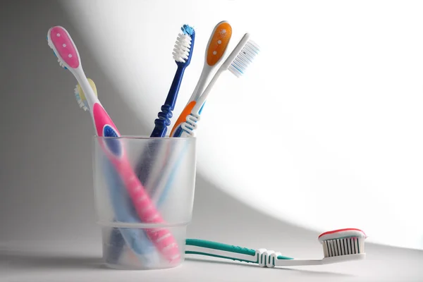 stock image Toothbrushes in a glass