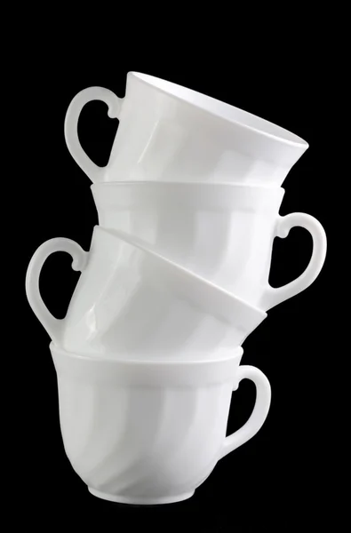 Куча белых блестящих чашек — стоковое фото