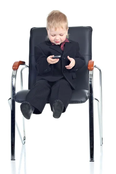 Little businessman with a phone — Stock Photo, Image