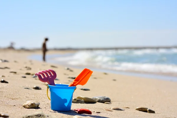 stock image Plastic bucket on the beach