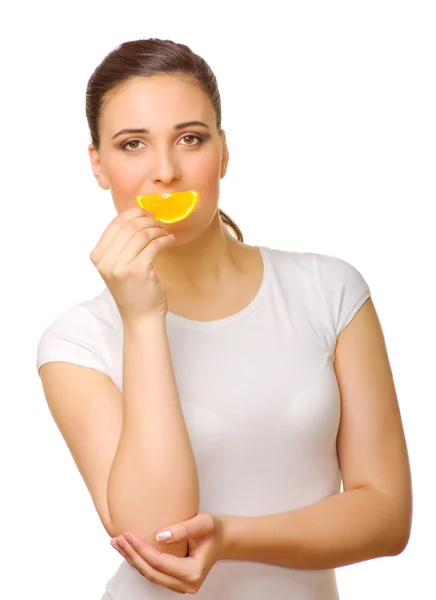 Mladá dívka s plátek pomeranče — Stock fotografie