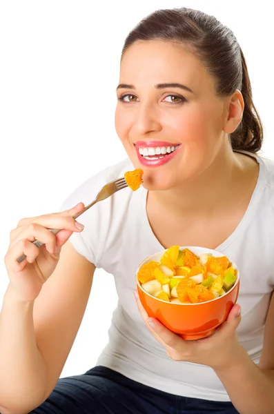 Chica joven con ensalada de frutas — Foto de Stock