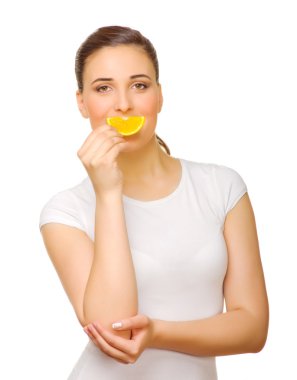 Young girl with orange slice