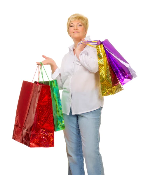 Mujer mayor con bolsas — Foto de Stock