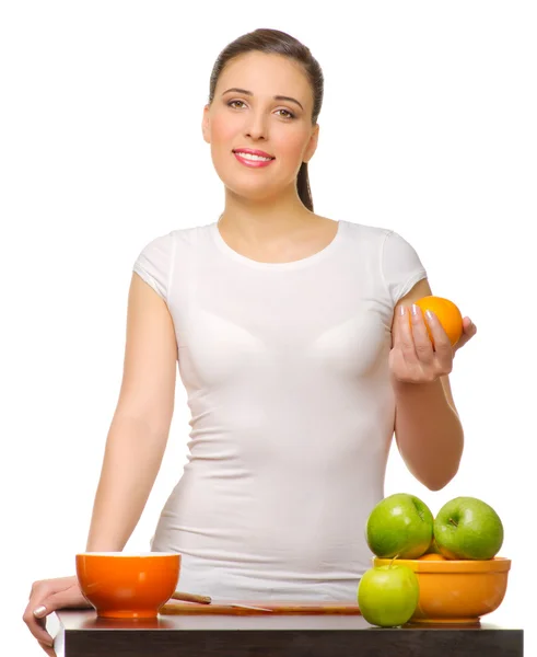 Joven mujer sonriente con frutas —  Fotos de Stock