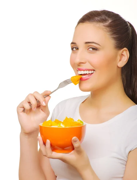 Mujer joven con ensalada de frutas —  Fotos de Stock