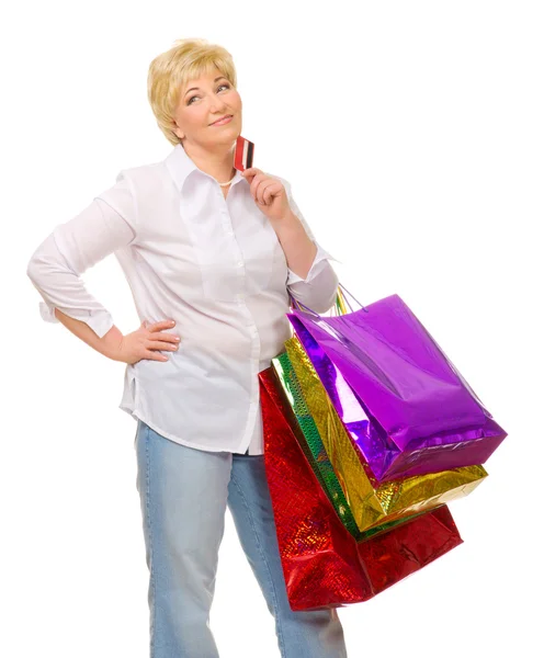 Donna anziana con borse e carta di credito — Foto Stock