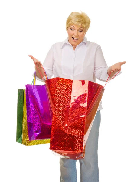 Senior woman with bags — Stock Photo, Image