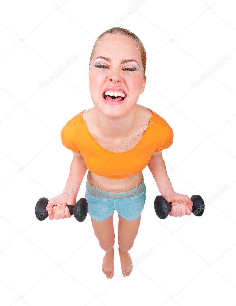 Young funny woman with dumbbells