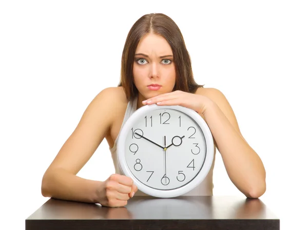 Young angry girl with clocks — Stock Photo, Image