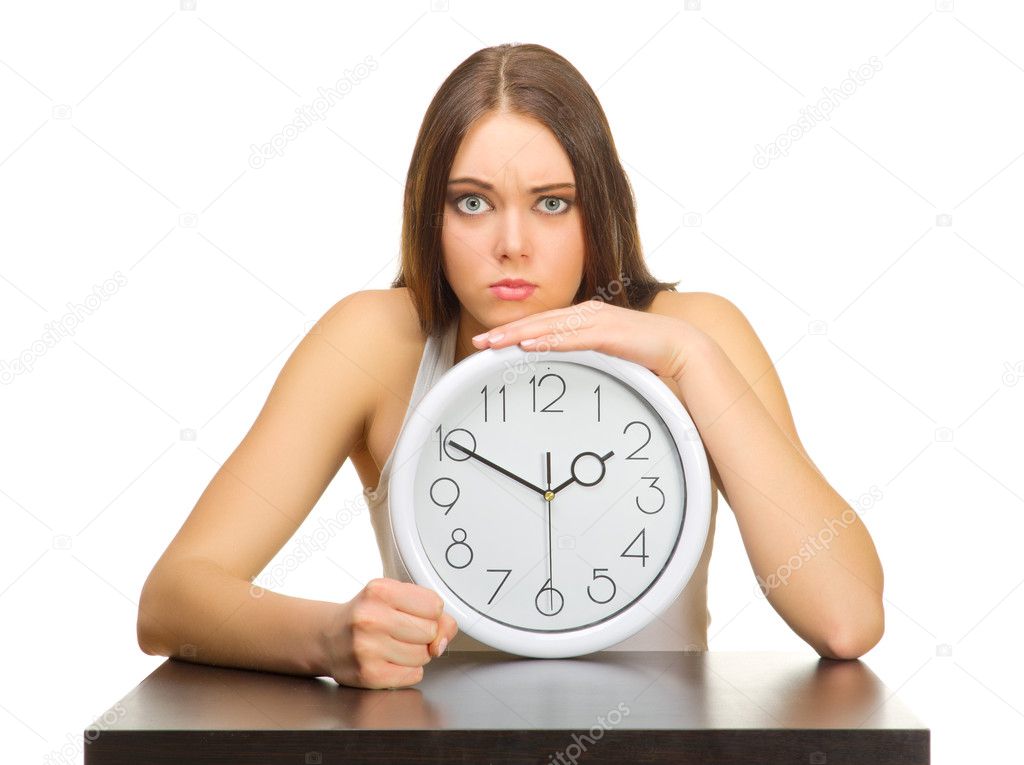 Young angry girl with clocks