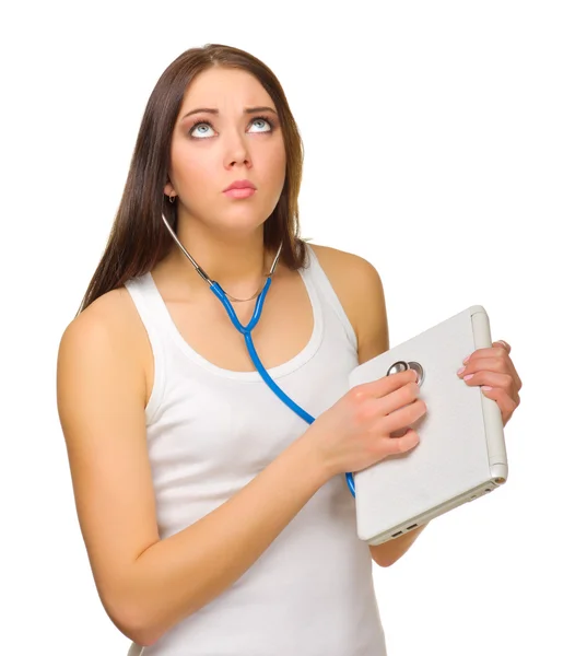 Young girl with laptop and stethoscope — Stock Photo, Image