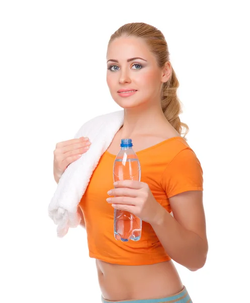 Young woman with bottle and towel — Stock Photo, Image