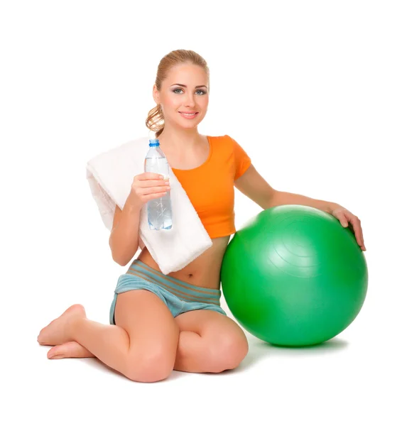 Young sporty woman with gymnastic ball — Stock Photo, Image