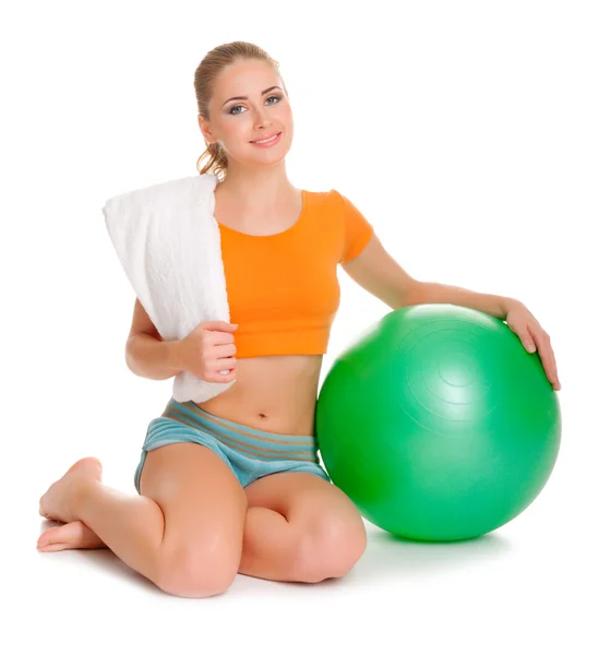 Young sporty woman with ball — Stock Photo, Image