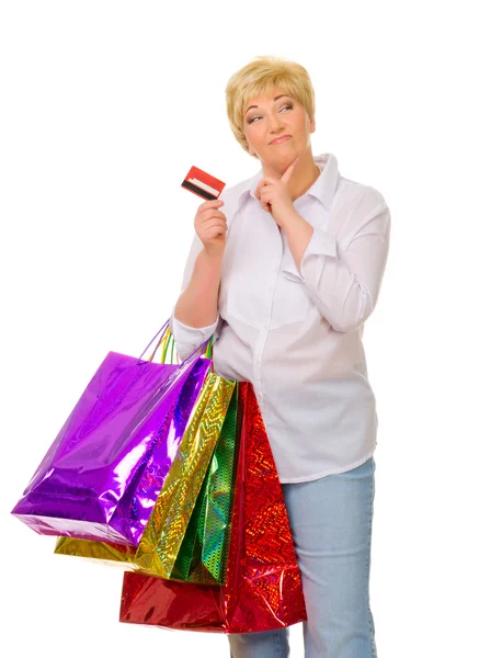 Femme âgée avec sacs et carte de crédit — Photo