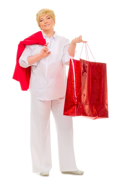 Happy senior woman with bag — Stock Photo, Image