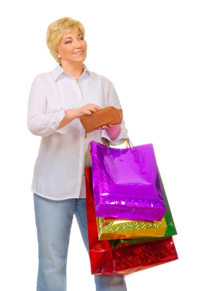 Senior woman with wallet and bags — Stock Photo, Image