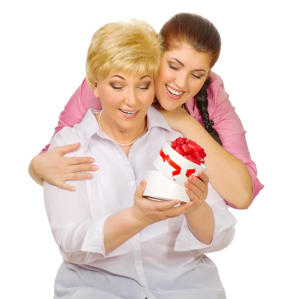 Senior and young woman with gift — Stock Photo, Image
