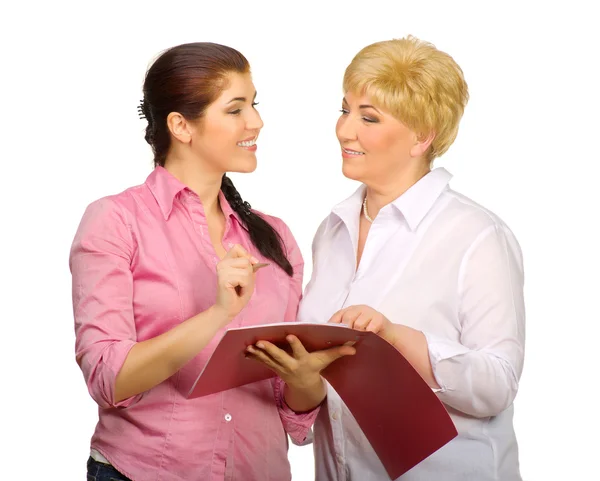 Senior and young woman with folder — Stock Photo, Image