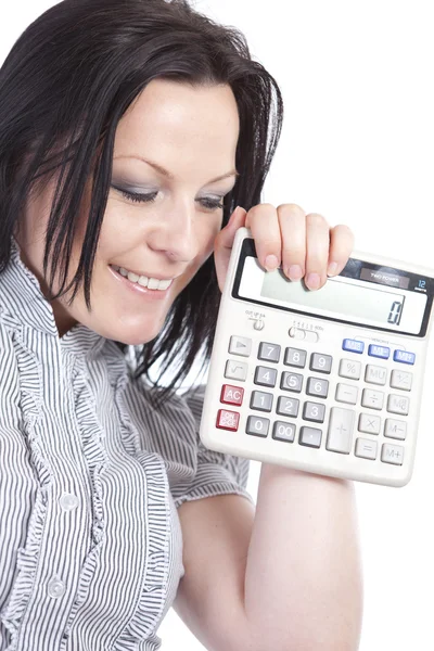 Smiling woman holding calculator over white — Stock Photo, Image