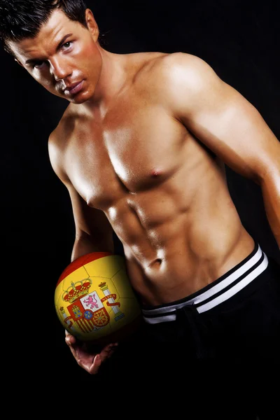 Espania フラグとボールを保持しているフットボール選手 — ストック写真