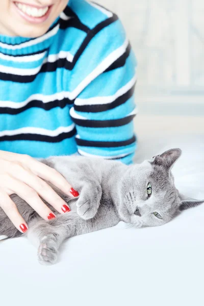 Догляд за тілом кішка — стокове фото
