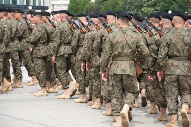 Soldiers during the drill on the square before Polish Army Day clipart