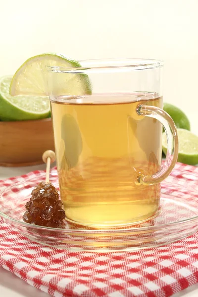 Lemon tea with candy — Stock Photo, Image